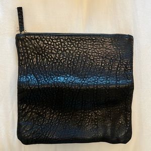 Clare Vivier foldable black leather clutch